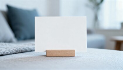 Blank White Card Mockup on Wooden Stand for Personalized Messages in Home Interior
