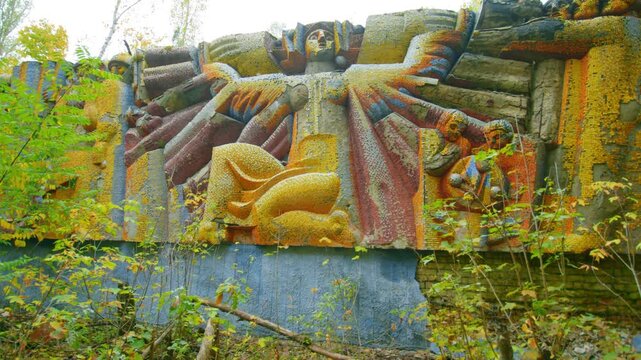 An evocative view of the Stvorennia Creation mosaic, a striking example of Soviet era art, located on Lenin Avenue in the abandoned city of Pripyat, Ukraine.