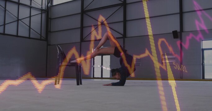 Stretching contortionist bending on chair and forearms in industrial hall with neon graph overlays - Powered by Adobe