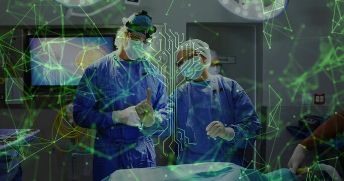 Two surgeons wearing blue scrubs performing brain surgery in operating theater, using AR overlay