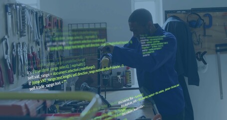 Technician in blue hoodie operating drill press in workshop with pegboard, code overlay, copy space