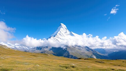 Matterhorn Majesty: A majestic snow-capped peak ascends toward a vibrant, cloud-dotted azure sky. An awe-inspiring panorama of the Swiss Alps and its captivating environment