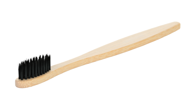 Bamboo toothbrush, isolated on transparent background, full focus for sharp detail. Eco oral care accessory, sustainable hygiene tool for daily dental cleaning routine