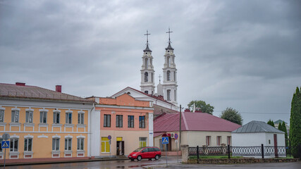 Naklejka premium central square with churches in the city of Oshmyany. Belarus