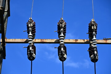 Obraz premium High voltage power line transformer with insulators 