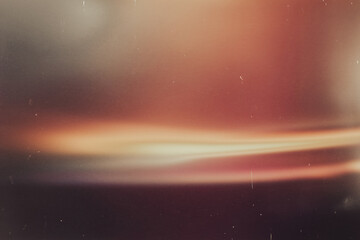 Obraz premium light leak overlay effect with scratch dust and blur light leaks,retro film noisy texture light leak flare on black background,abstract background with light,old film blackground