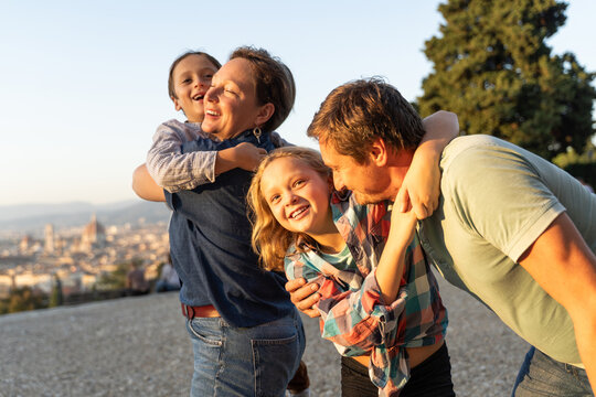 Family enjoying time in Florence, Italy at sunset