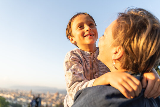 Mother and son enjoying sunset in Florence