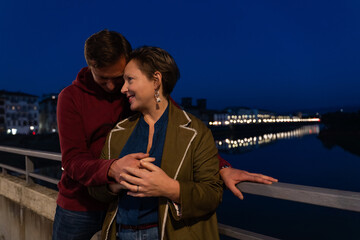 Romantic evening on a bridge in Florence