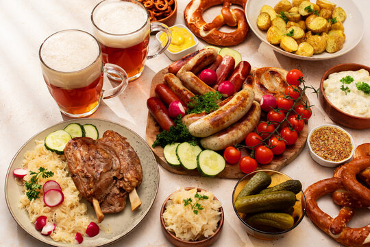 Oktoberfest food table with sausages and beer on display