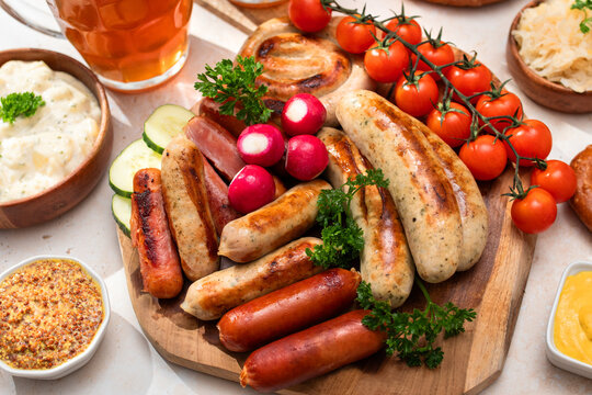 Oktoberfest food platter with sausages and accompaniments