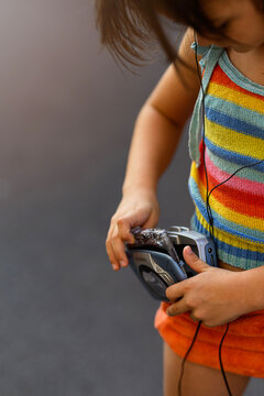 Girl with skates and walkman enjoying nostalgia