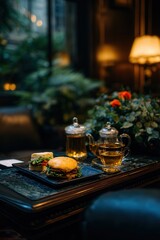 A gourmet meal featuring a juicy burger and a colorful sandwich on a decorative plate, accompanied by a cup of tea, set in a cozy, lush environment, Ideal for food blogs, menus, or cafÃ© promotions,