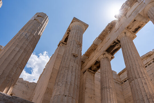 Majestic pillars of the Acropolis under clear sky