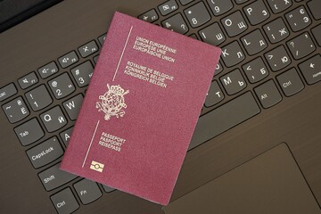 Belgium Passport Lies Black Laptop