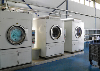 Industrial Laundry Machines in Factory Interior