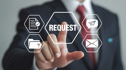 Digital Request: A businessman in a suit, elegantly points at a virtual button, an innovative depiction of digital requests and communication through modern technology.