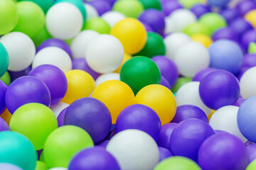 Close-up of bright colorful play balls. Background.
