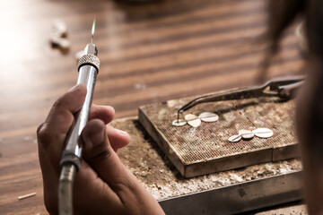 blowtorch heating jewelry