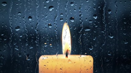 Candle flame glowing behind raindrop-covered window on a dark night - Powered by Adobe