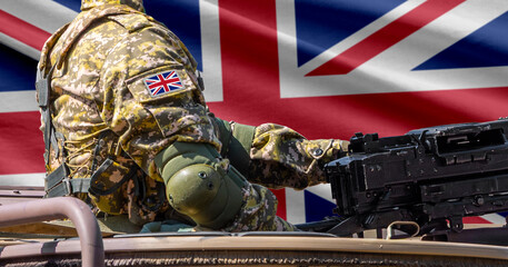 Fototapeta premium Great Britain national flag with soldier at machinegun turret