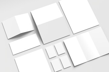Array of blank stationery items arranged on a light gray background. 