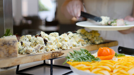 Experience a Diverse Buffet Featuring a Collection of Fresh Salads and Delectable Dishes