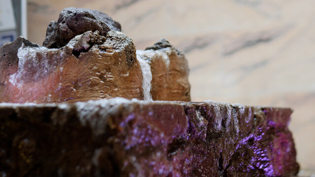 Bubbling Natural Mineral Water Feature with an Elegant Rock Display in a Peaceful Environment