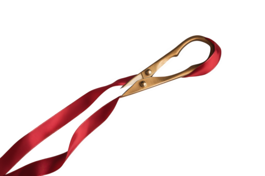 Scissors cutting a red ribbon isolated on transparent background for ceremony