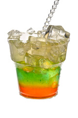 Glass of cocktail with ice over white background