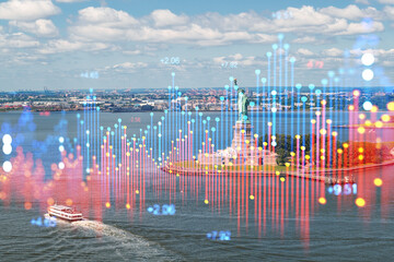 A composite photo with the Statue of Liberty and financial holographic data overlaid, on a bright day background. Technology and finance concept. Double exposure
