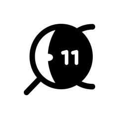 Black round shape with a white crescent moon inside and the number eleven displayed on the right side