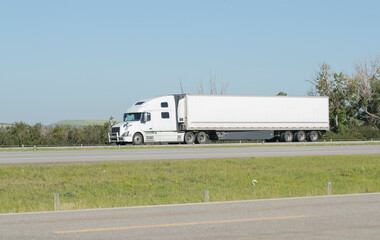 Heavy Cargo on the Road. A truck hauling freight along a highway