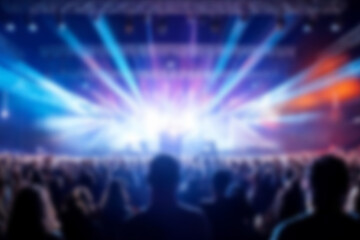 Blurred background rock concert with light background, concert in hall at night. people enjoying music performance in hall. musicians on the stage and spotlights with colored rays. concert and crowd.