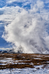 Explore the captivating geothermal area in Hverir Iceland, where steam rises from the earth,  travel in iceland by road trip.