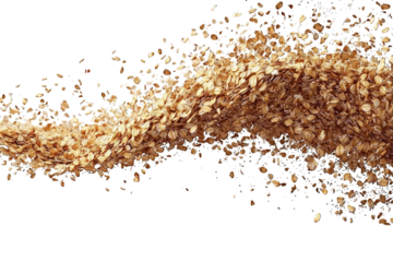 Scattered flakes of light brown cereal or grain on a dark, isolated background