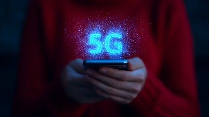 A person holds a smartphone displaying a glowing "5G" symbol, representing advanced mobile technology and connectivity.