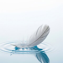 A delicate white feather gracefully touching the water's surface, creating gentle ripples and a serene reflection, evoking feelings of peace and tranquility