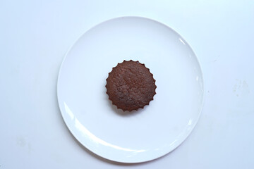 Chocolate small cake on a plate
