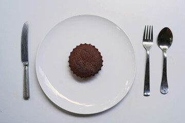 Chocolate cake with fork and spoon, knife