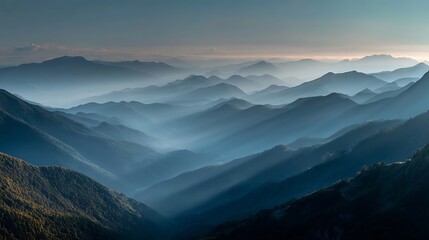 Obraz premium Misty Mountain Ranges at Dawn A Serene Landscape Photography