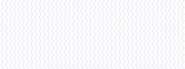 This is a subtle and clean geometric background pattern of repeating zigzags in a light gray color.