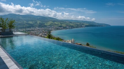 Obraz premium Serene Infinity Pool Overlooking Coastal City and Mountains on a Sunny Day, Ideal for Vacation and Travel
