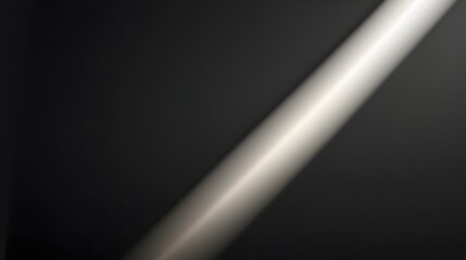 A beam of bright light shines diagonally across a plain dark gray surface in a simple modern background.