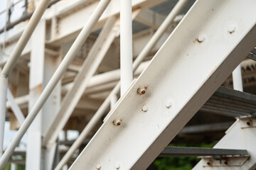 An overpass walkway across the production pipeline at the petrochemical and refinery plant....