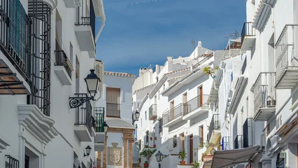 Gordijnen Smalle Straten Streets in Frigiliana, typical Andalusian village with white houses, Spain  © vli86