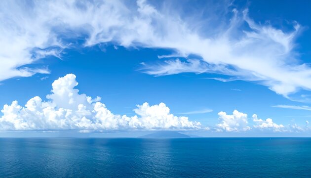 Wide shot of a placid ocean and a vibrant sky