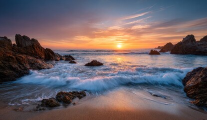Fototapeta premium Coastal sunset over rocks and waves