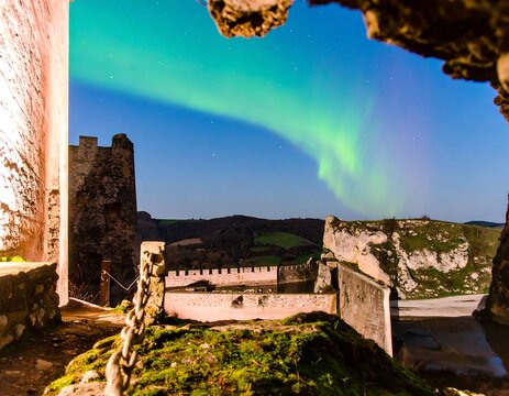 Ancient castle, aurora borealis - Powered by Adobe