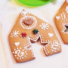 Beautiful decorated gingerbread star cookies with white royal icing and colorful details